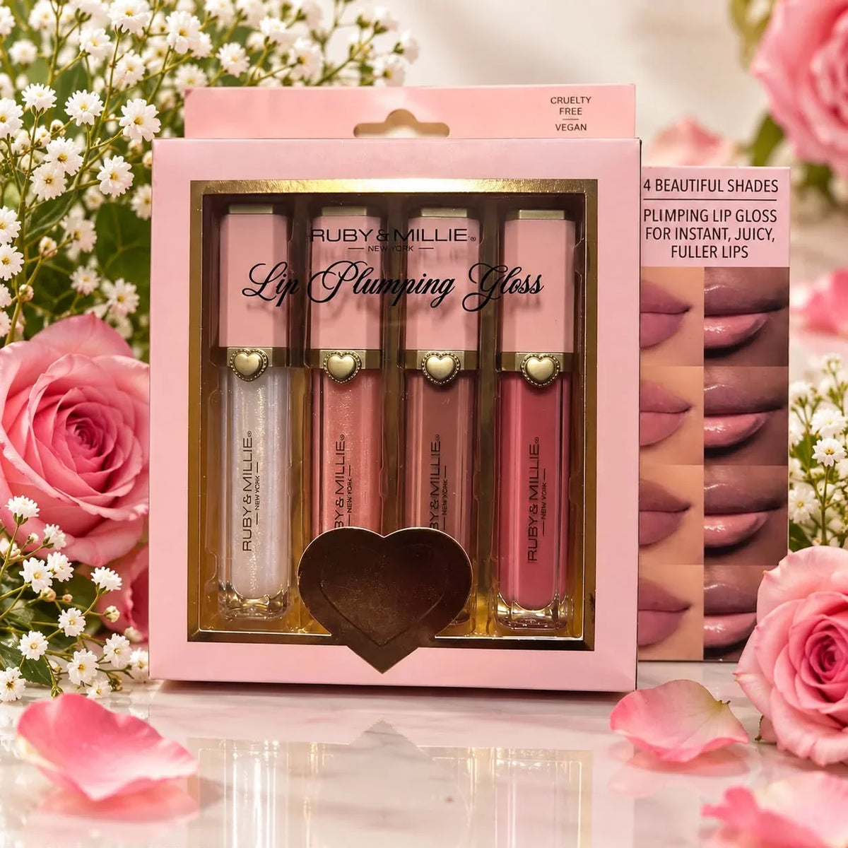 Ruby & Millie Lip Plumping Gloss set with four shades in pink packaging.